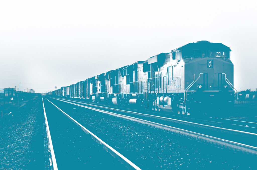 A freight train hauling loads that may be utilizing freight logistics for delivery similar to those used by E&E Logistics Co. LLC in Fresno, CA.